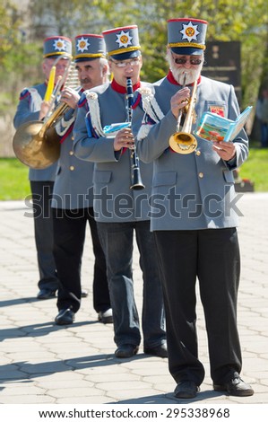 RUSSIA, ROSTOV CITY - MAY 9: Unidentified orchestra musicians walk on Victory day parade dedicated 70 anniversary of WWII end on May 9, 2015, Rostov the Great city, Russia
