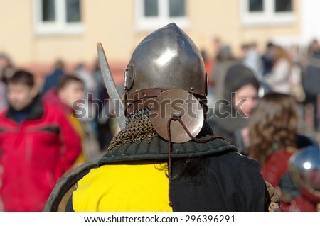 RUSSIA, MOSCOW - MARCH 14: Unidentified knight stand back on tournament on history reenactment of the Medieval maneuvers in Moscow, 14 March, 2015, Russia