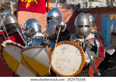 RUSSIA, MOSCOW - MARCH 14: Unidentified knights in row on tournament on history reenactment of the Medieval maneuvers in Moscow, 14 March, 2015, Russia