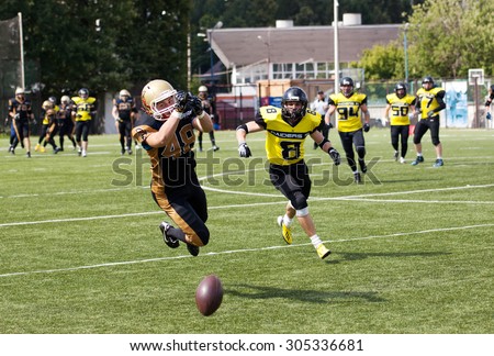 RUSSIA, TROITSK CITY - JULY 11: Alexeev Grigoriy (48) in action on Russian american football Championship game Spartans vs Raiders 52 on July 11, 2015, in Moscow region, Troitsk city, Russia