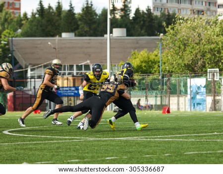 RUSSIA, TROITSK CITY - JULY 11: A. Rogovoy (99) in action on Russian american football Championship game Spartans vs Raiders 52 on July 11, 2015, in Moscow region, Troitsk city, Russia