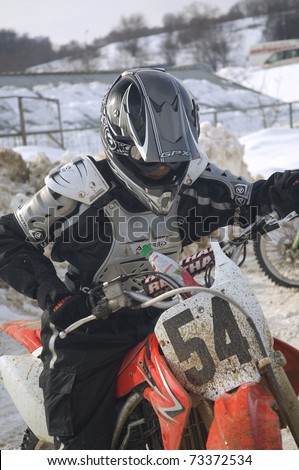 MOSCOW - FEBRUARY 28: Unrecognised sportsman on a second tour of motocross competition of Red Racing Group club on February 28, 2010 in Moscow, Krilatskoe, Russia