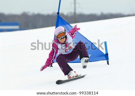 MOSCOW, RUSSIA - MARCH 31: Rozanova Kseniya(63) falling down at closing winter season competition on March 31, 2012 in Peredelkino, Moscow, Russia. Competition is skiing on a one ski