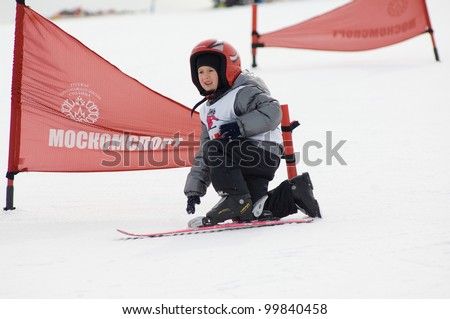 MOSCOW, RUSSIA - MARCH 31: Kureneva Polina(45) falls down at closing winter season competition on March 31, 2012 in Peredelkino,Moscow, Russia. Competition is skiing on a one ski