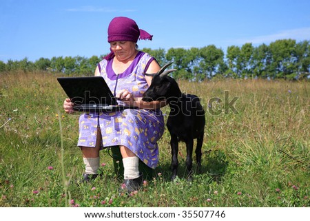 The elderly woman with the laptop, near it a black kid