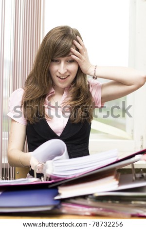 Girl looks troubled at the office