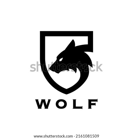 Black wolf shield logo. Wild animal badge icon. Wolves silhouette symbol. Canine predator emblem. Vector illustration.