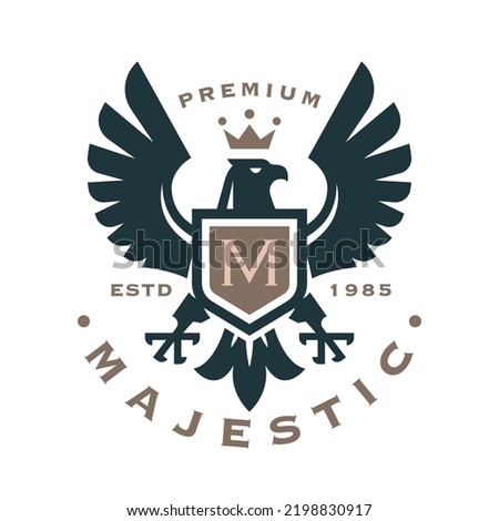 Majestic eagle crest logo. Hawk shield icon. Falcon heraldry monogram symbol. Luxury brand label. Royal heraldic bird with crown emblem. Vector illustration.