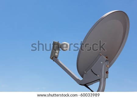 Satellite Dish Antenna with blue gradient sky. Copy space