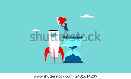 time to build a business startup, success steps in building a start-up business, journey to success in starting a business, businessman climbs the big hourglass and completes the rocket design