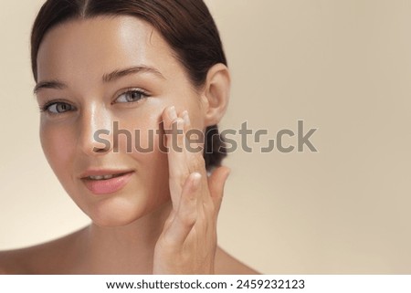 Similar – Image, Stock Photo Young beautiful woman in the shallow water in the Baltic Sea looks to the side and smiles