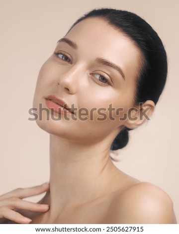 Similar – Image, Stock Photo beautiful woman of Caucasian appearance with black hair dances in drops of water on a black background. The woman is wearing a white chiffon dress