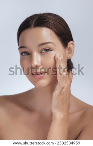 Similar – Image, Stock Photo Spa. Beautiful young woman. Face of attractive female model lying down during skin care procedures.