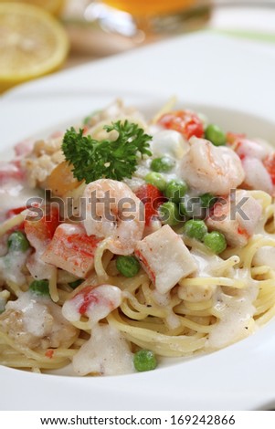The spaghetti with seafood on the table.