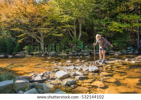 Similar – Image, Stock Photo cross a stream with hiking boots