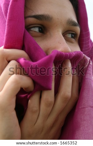 muslim woman hiding her face