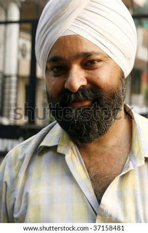 PUNJAB, INDIA - MARCH 20: Sikh man with a turban. As of March 20, 2007, the Punjabi region has the most sikhs in India, worldwide there are about 25 million Sikhs.