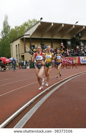 TARTU, ESTONIA - MAY 20: Athletes running along the track and taking part in Student Sell Games, organized by Estonian Academic Sports Federation in May 20, 2006