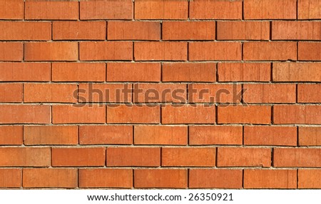 closeup of a brick wall with red bricks - texture background