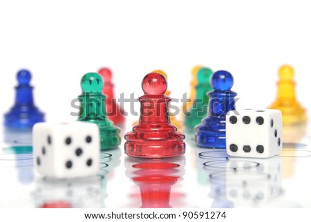 Ludo game with multicolored glass figures