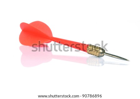 Red colored dart on white background