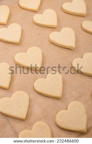 Christmas cookies in heart shape in vertical format