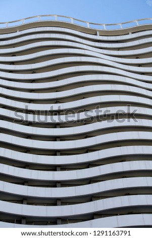 Similar – Image, Stock Photo Geometric facade of a minimalist building under the last afternoon lights