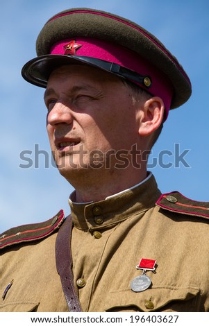 KIEV, UKRAINE - MAY 11, 2013 :Unidentified member of Red Star history club wear historical Soviet uniform during historical reenactment of WWII