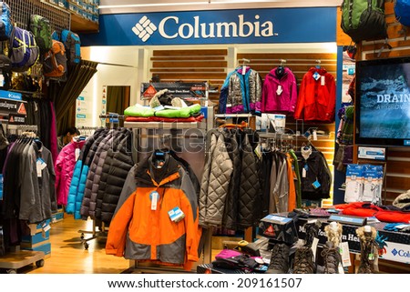 BANGKOK,THAILAND - NOVEMBER 19, 2013 : Columbia clothing section in a supermarket Siam Paragon in Bangkok. With 300,000 sqm of retail space Siam Paragon is one of the world\'s largest malls.