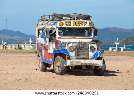 CORON, PHILIPPINES - FEBRUARY 07, 2014 :Jeepneys passing, Philippines inexpensive bus service. Jeepneys are the most popular means of public transportation in the Philippines.