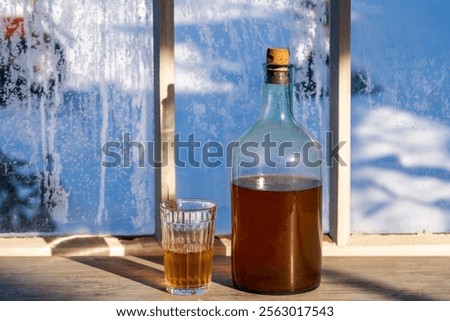 Similar – Image, Stock Photo Brown glass jar near fir branches and pine cones on dark green top view. Brand packaging mockup.