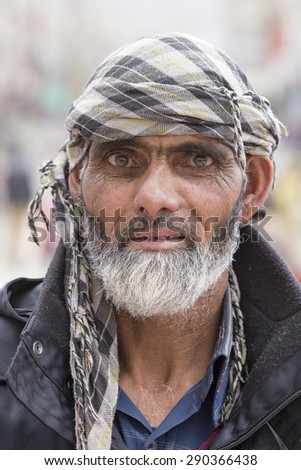LEH, INDIA - JUNE 24, 2015: Unidentified tibetan old man on the street in Leh, Ladakh.