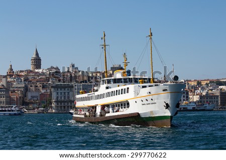 ISTANBUL, TURKEY - JULY 21, 2015 : Beyoglu district, tourist ship and water Golden Horn in Istanbul, Turkey