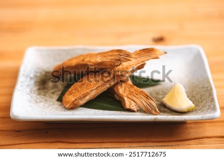 Image, Stock Photo Fish fin on plate Plate