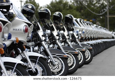 Police motorcycles lined up at a funeral