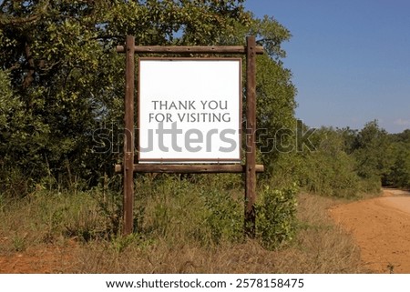 Image, Stock Photo South? No, thank you. These cranes are staying here. Elegantly they fly above the trees against a grey sky.