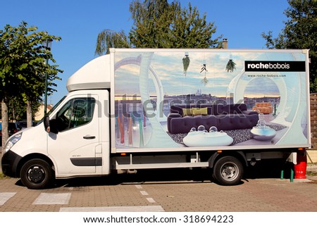 OZOIR LA FERRIERE, FRANCE - SEPTEMBER 20, 2015: Vehicle of Roche Bobois in Ozoir la FerriÃ¨re, France. Roche Bobois is a French company that sells high-end furniture .
