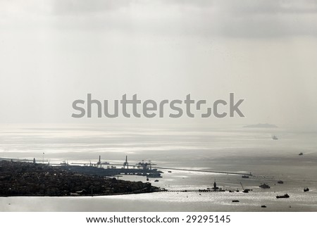 international container terminal in port of Istanbul with cloudy sky