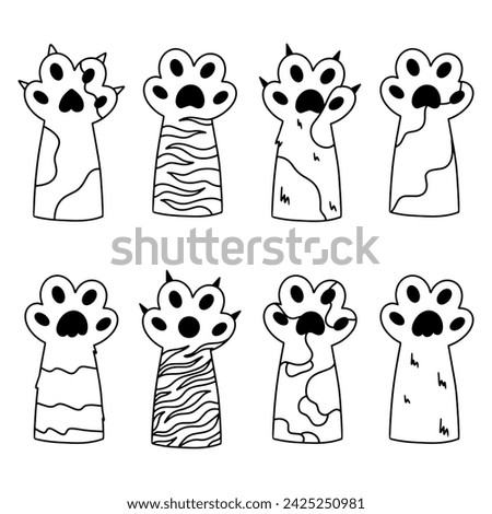 A collection paws of a cat. Various cartoon paws. Funny furry paws, sharp claws. line art