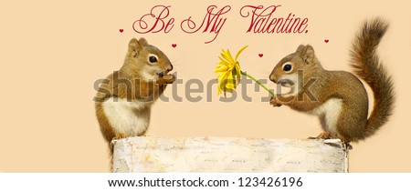 Valentine\'s Day card design for a child\'s Valentine  day exchange featuring a little male squirrel giving his little female friend a flower.