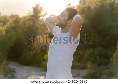 Similar – Image, Stock Photo Man takes a sunset photo on the phone