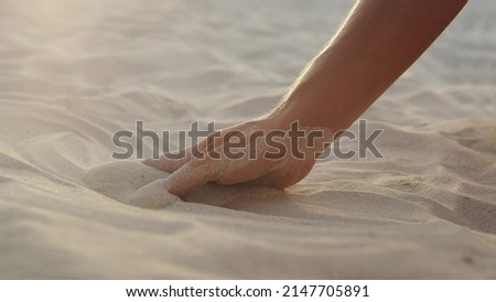 Similar – Image, Stock Photo Crop woman on sandy beach during vacation