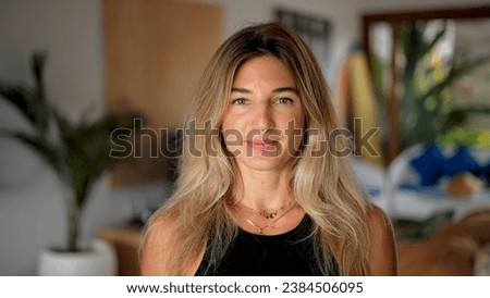 Similar – Image, Stock Photo Portrait of young woman with light curly hair in straw hat enjoying sun and breeze, smiling. Sunny harbor with boats and yachts, green mountains on background. Enjoying life, happy person traveling,