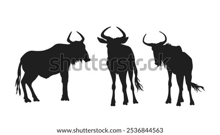 Isolated silhouette of wildebeests. African scene of savannah animals. Antelope gnu portrait. Zoo clipart. Vector illustration