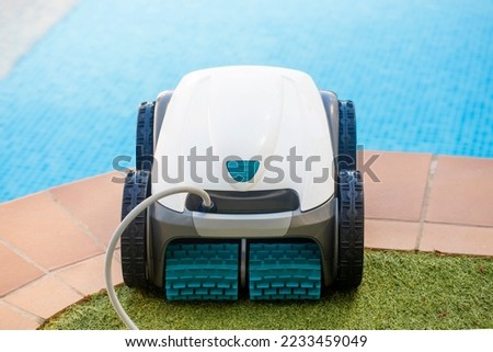 Similar – Image, Stock Photo Swimming pool cleaner robot during vacuum service, maintenance. Top view