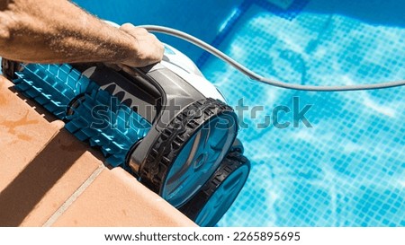 Image, Stock Photo Swimming pool cleaner robot during vacuum service, maintenance. Top view