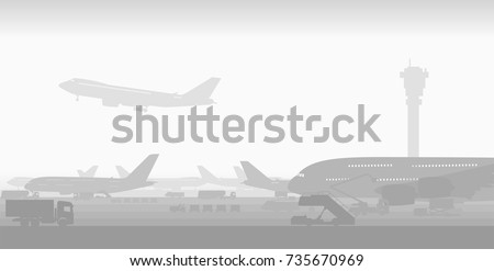 international airport with big passenger planes in early morning fog