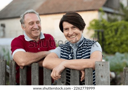 Similar – Image, Stock Photo Woman on fence in mountainous area