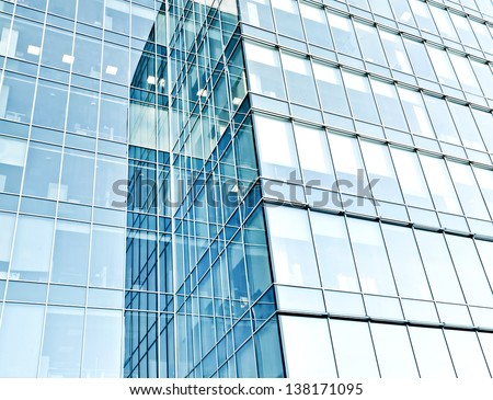 Similar – Image, Stock Photo Office buildings reflected over an urban glass facade