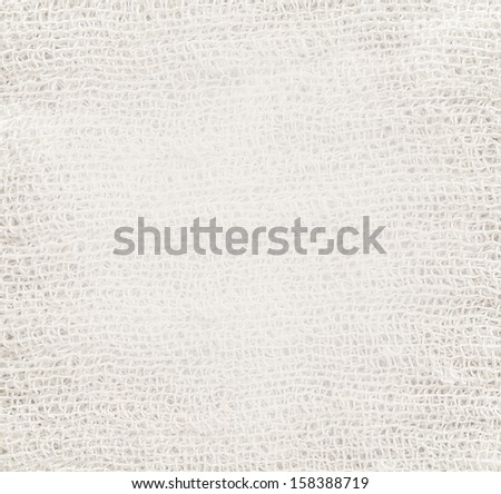 White and light gray texture of gauze background with sparse threads and clear space for your own text
